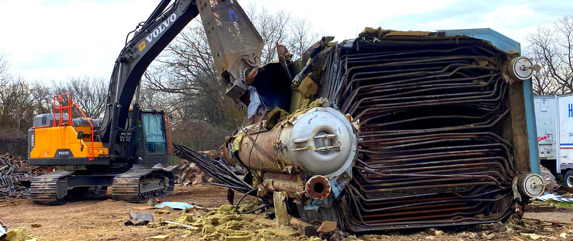 large construction equipment demolition of metal