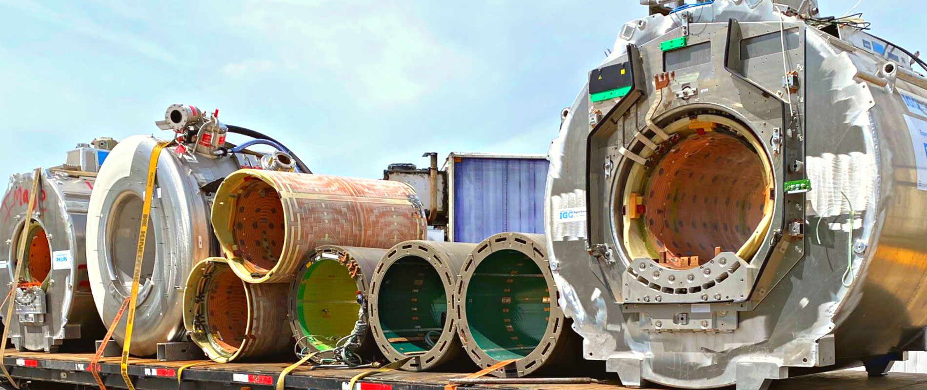 An Aerial View of the flatbed of broken-down MRI machines in Dallas, TX