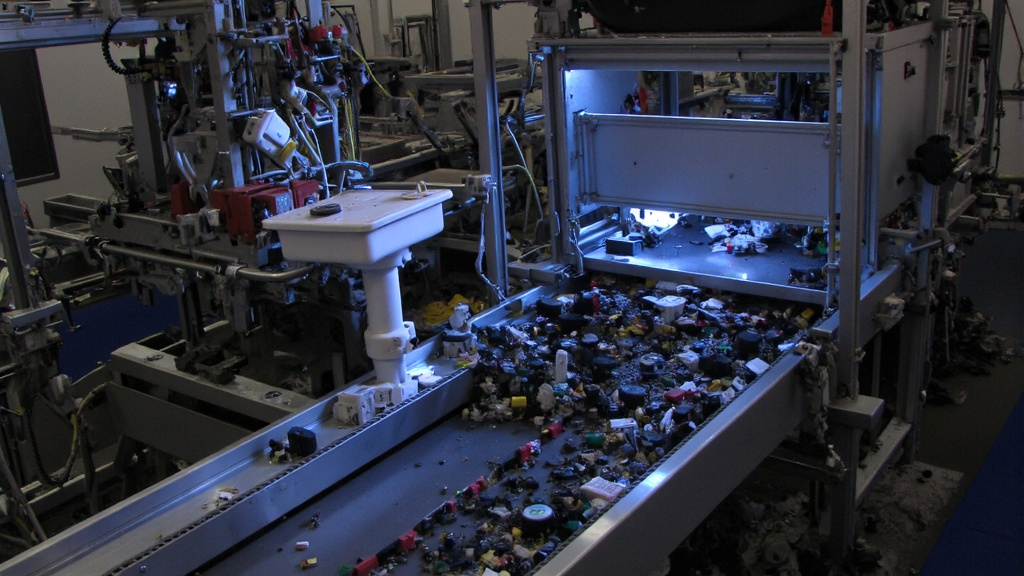 Futuristic Electronic Waste Sorting System Futuristic automated sorting system for electronic waste focusing on magnet extraction.