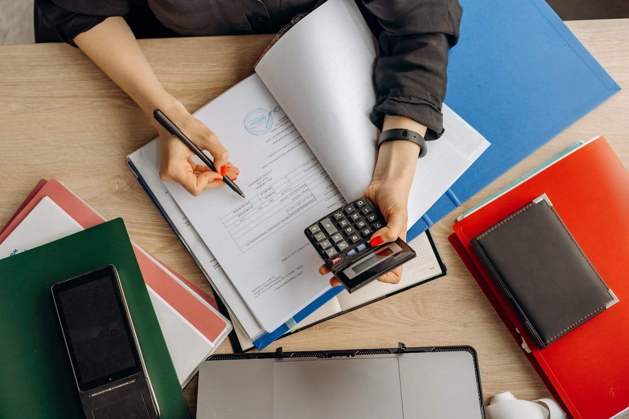 Man calculating tax incentives for copper recycling in Dallas, TX
