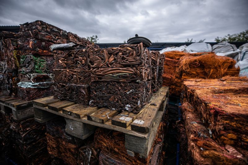 Crushed baled copper on pallet for recycling in Dallas, TX